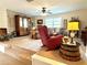 Large living room with classic furnishings and a tiered floor at 4745 Belcrest Way, Cumming, GA 30040