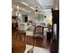 Well-designed living area with hardwood floors, coffered ceilings, and neutral furnishings at 4745 Belcrest Way, Cumming, GA 30040
