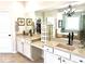 Beautiful bathroom with double sinks, vanity area, and natural light at 4745 Belcrest Way, Cumming, GA 30040