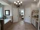 Spacious bathroom with a soaking tub, double sinks, and separate shower at 4745 Belcrest Way, Cumming, GA 30040