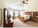 Spacious main bedroom with vaulted ceilings, a ceiling fan, and bright windows at 4745 Belcrest Way, Cumming, GA 30040