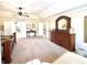 Expansive main bedroom with sitting area and multiple doorways at 4745 Belcrest Way, Cumming, GA 30040