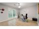 Bright office space featuring a large window and neutral decor, ideal for a productive workspace at 1328 Hidden Hills Pkwy, Stone Mountain, GA 30088