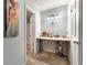 Dedicated make-up vanity area with ample lighting and a convenient adjacent bath and closet at 1328 Hidden Hills Pkwy, Stone Mountain, GA 30088
