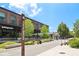 Outdoor shot of the Atlanta BeltLine with retail shops, trees, and bike and scooter parking at 300 Brickworks Ne Cir # 302, Atlanta, GA 30307