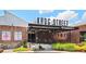 View of Krog Street Market with outdoor seating area and brick facade, a retail and dining destination at 300 Brickworks Ne Cir # 302, Atlanta, GA 30307