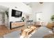 Modern living room with open concept kitchen and dining area at 300 Brickworks Ne Cir # 302, Atlanta, GA 30307