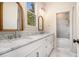 Elegant bathroom featuring double sinks, marble countertops, stylish fixtures, and a luxurious shower at 50 Howell Se St # A, Atlanta, GA 30312