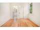 Bright bedroom with hardwood floors, white walls, and ensuite bathroom for a clean and modern feel at 50 Howell Se St # A, Atlanta, GA 30312