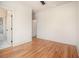 Neutral bedroom with hardwood floors, an ensuite bathroom, and modern fixtures offering a serene retreat at 50 Howell Se St # A, Atlanta, GA 30312