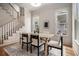 Cozy dining area featuring a rustic table with modern chairs and a large area rug at 50 Howell Se St # A, Atlanta, GA 30312