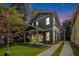 Charming two-story home with a well-manicured lawn and inviting front porch creating a welcoming atmosphere at 50 Howell Se St # A, Atlanta, GA 30312
