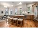 Spacious kitchen featuring a large island with seating, stainless steel appliances, and hardwood floors at 50 Howell Se St # A, Atlanta, GA 30312