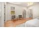 Bright bedroom with hardwood floors and neutral tones, complemented by lots of natural light at 50 Howell Se St # A, Atlanta, GA 30312