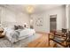 Spacious main bedroom with custom wall design, hardwood floors and lots of natural light at 50 Howell Se St # A, Atlanta, GA 30312