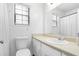Bright bathroom with a window and modern sink at 830 The Cir, Lawrenceville, GA 30043