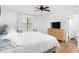 Bedroom featuring a large window and dresser at 830 The Cir, Lawrenceville, GA 30043