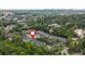 Aerial view of property within a tree-lined community, with a red marker indicating its location at 9 Saint Claire Ne Ln, Atlanta, GA 30324