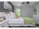 Comfortable bedroom featuring natural light, modern decor, and neutral color palette at 9 Saint Claire Ne Ln, Atlanta, GA 30324