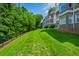 Exterior view showcasing green space surrounding property at 9 Saint Claire Ne Ln, Atlanta, GA 30324