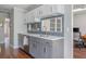 Kitchen with stainless steel dishwasher, shaker cabinets, and stylish backsplash at 9 Saint Claire Ne Ln, Atlanta, GA 30324