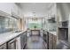 Bright, updated kitchen with stainless steel appliances, shaker cabinets, and eat-in nook at 9 Saint Claire Ne Ln, Atlanta, GA 30324