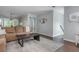 Spacious living room with hardwood floors, comfortable seating, and access to other rooms at 9 Saint Claire Ne Ln, Atlanta, GA 30324