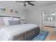 Spacious main bedroom with hardwood floors, light fixtures, and an ensuite bathroom at 9 Saint Claire Ne Ln, Atlanta, GA 30324