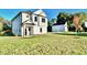 Well-maintained lawn with lush grass and a detached garage at 12 Confederate Nw St, Cartersville, GA 30121