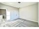 Neutral bedroom featuring a large closet, neutral walls, soft carpeting and plenty of natural light at 12 Confederate Nw St, Cartersville, GA 30121