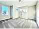 Bright bedroom featuring neutral paint, plush carpeting, double-door closet, and a window with neighborhood views at 12 Confederate Nw St, Cartersville, GA 30121
