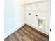 Functional laundry room featuring vinyl floors, and laundry hookups at 12 Confederate Nw St, Cartersville, GA 30121