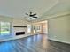 Spacious living area with a modern fireplace and hardwood floors at 12 Confederate Nw St, Cartersville, GA 30121