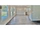 Open-concept living room filled with natural light and stylish flooring at 12 Confederate Nw St, Cartersville, GA 30121