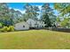 Spacious backyard with a well-kept lawn and a privacy fence provides an ideal space for recreation at 1406 Arden Sw Dr, Marietta, GA 30008
