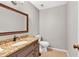 Half bathroom features a granite countertop and updated fixtures at 1406 Arden Sw Dr, Marietta, GA 30008