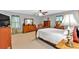 Spacious bedroom featuring carpet, ceiling fan, large windows, and classic furniture at 1406 Arden Sw Dr, Marietta, GA 30008