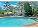 Lovely in-ground pool in a spacious back yard with an entertainment deck at 1406 Arden Sw Dr, Marietta, GA 30008
