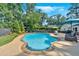 Beautiful in-ground pool with a patio and lush landscaping offers a refreshing outdoor experience at 1406 Arden Sw Dr, Marietta, GA 30008