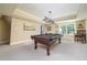 Basement game room featuring a pool table, neutral carpet and trim, and recessed lighting at 2015 Buford Dam Rd, Buford, GA 30518