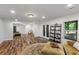 Finished basement offers ample living space with wood-look flooring at 2660 Brentwood Estates Ct, Cumming, GA 30041