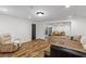 Spacious basement, ideal for relaxation or entertainment, features stylish flooring at 2660 Brentwood Estates Ct, Cumming, GA 30041