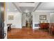 Elegant foyer features hardwood floors, high ceilings, and access to multiple rooms at 2660 Brentwood Estates Ct, Cumming, GA 30041