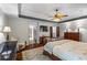Spacious main bedroom boasts tray ceilings and access to the ensuite bathroom at 2660 Brentwood Estates Ct, Cumming, GA 30041