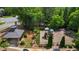 Aerial view of the community playground showcasing a covered picnic area, and various play structures at 2660 Brentwood Estates Ct, Cumming, GA 30041