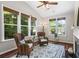 Sun room with plenty of natural light and a view of the backyard at 2660 Brentwood Estates Ct, Cumming, GA 30041
