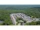 Aerial view of homes surrounded by lush green trees and a beautiful landscape at 3733 Chattahoochee Summit Se Dr # 7, Atlanta, GA 30339