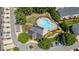 Aerial shot of the community clubhouse, pool, and manicured landscaping at 3733 Chattahoochee Summit Se Dr # 7, Atlanta, GA 30339