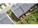 This aerial view showcases the home's layout, deck, and professionally landscaped yard at 3733 Chattahoochee Summit Se Dr # 7, Atlanta, GA 30339