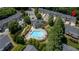 Community aerial shot showing community pool, clubhouse, and lush landscaping at 3733 Chattahoochee Summit Se Dr # 7, Atlanta, GA 30339